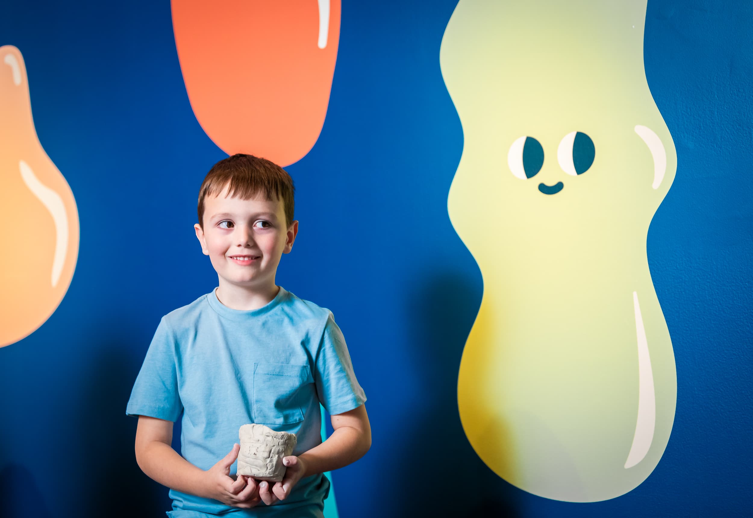 IAG Kids: Clay Studio Boy with clay bowl and cute graphics