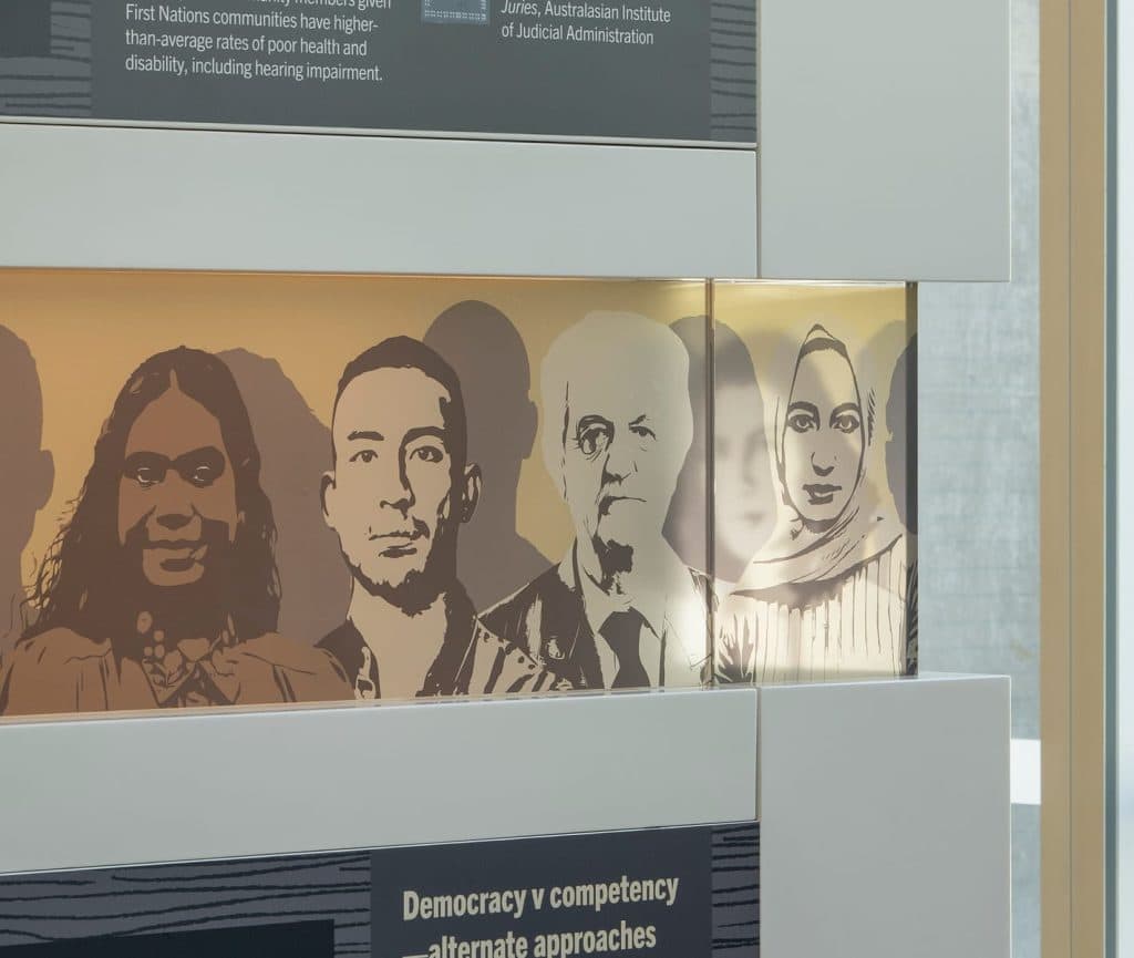 We, The Jury exhibition - close-up detail of portrait artworks
